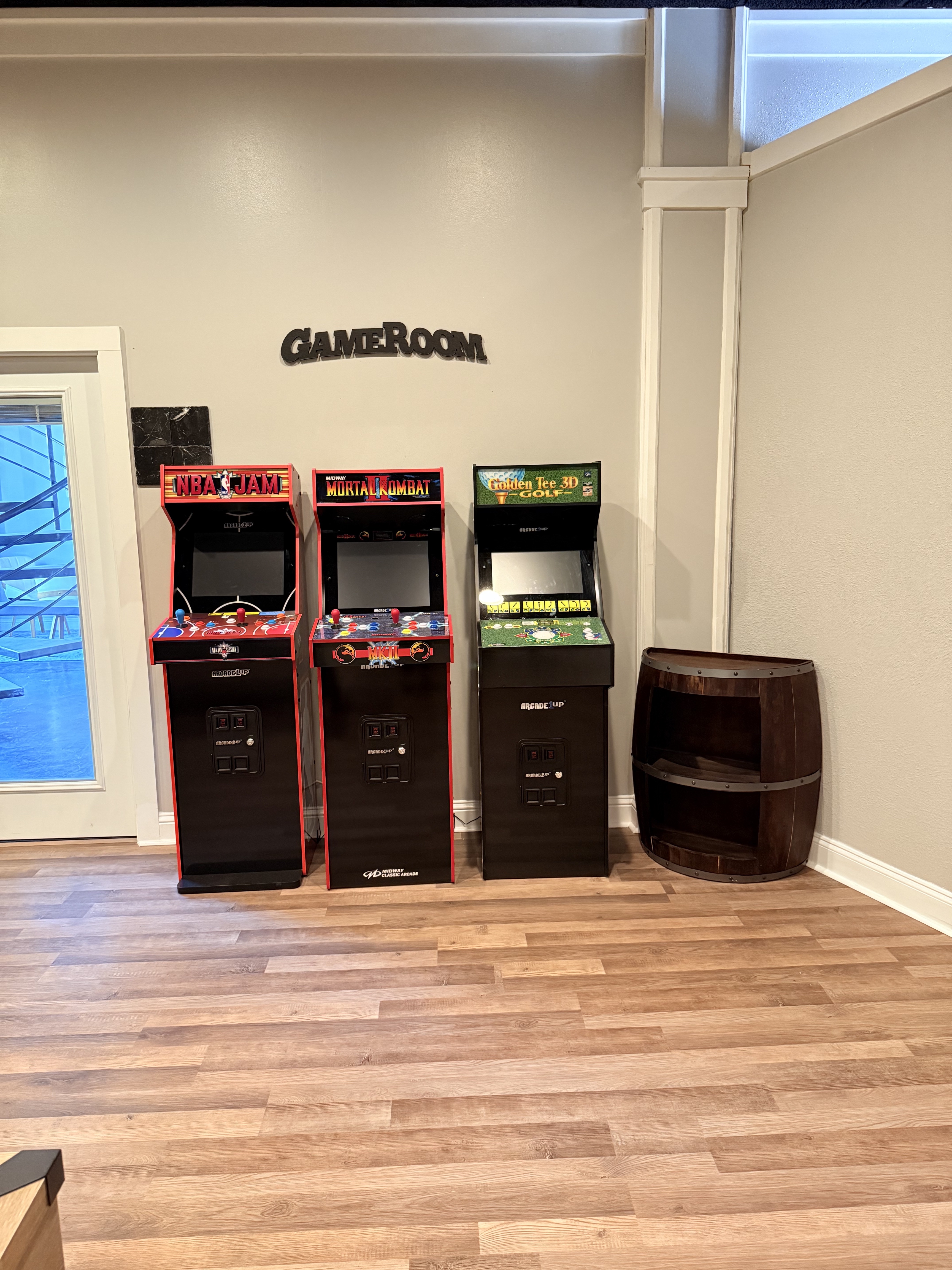 Game room with arcade machines and pool table