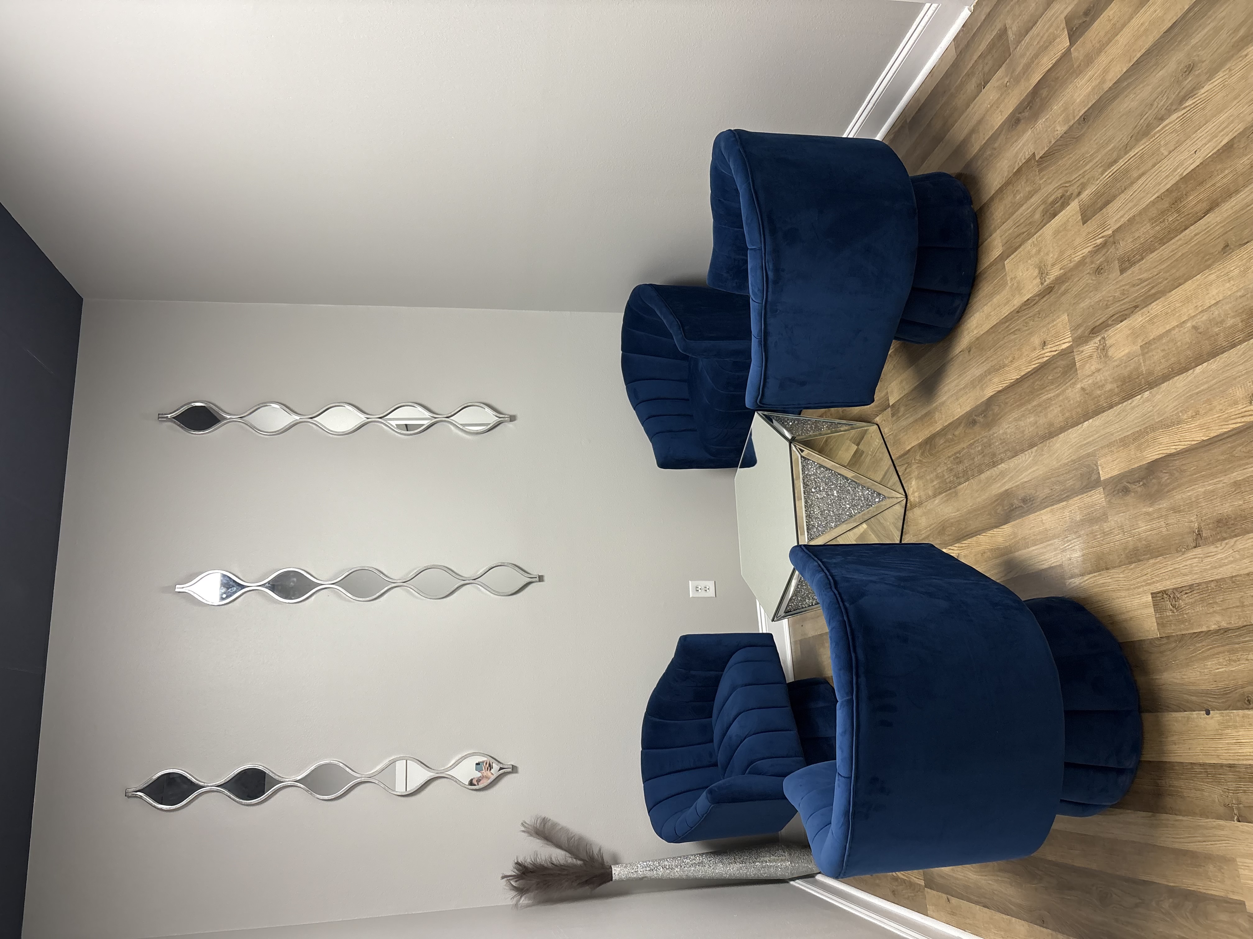 Additional sitting area with navy chairs